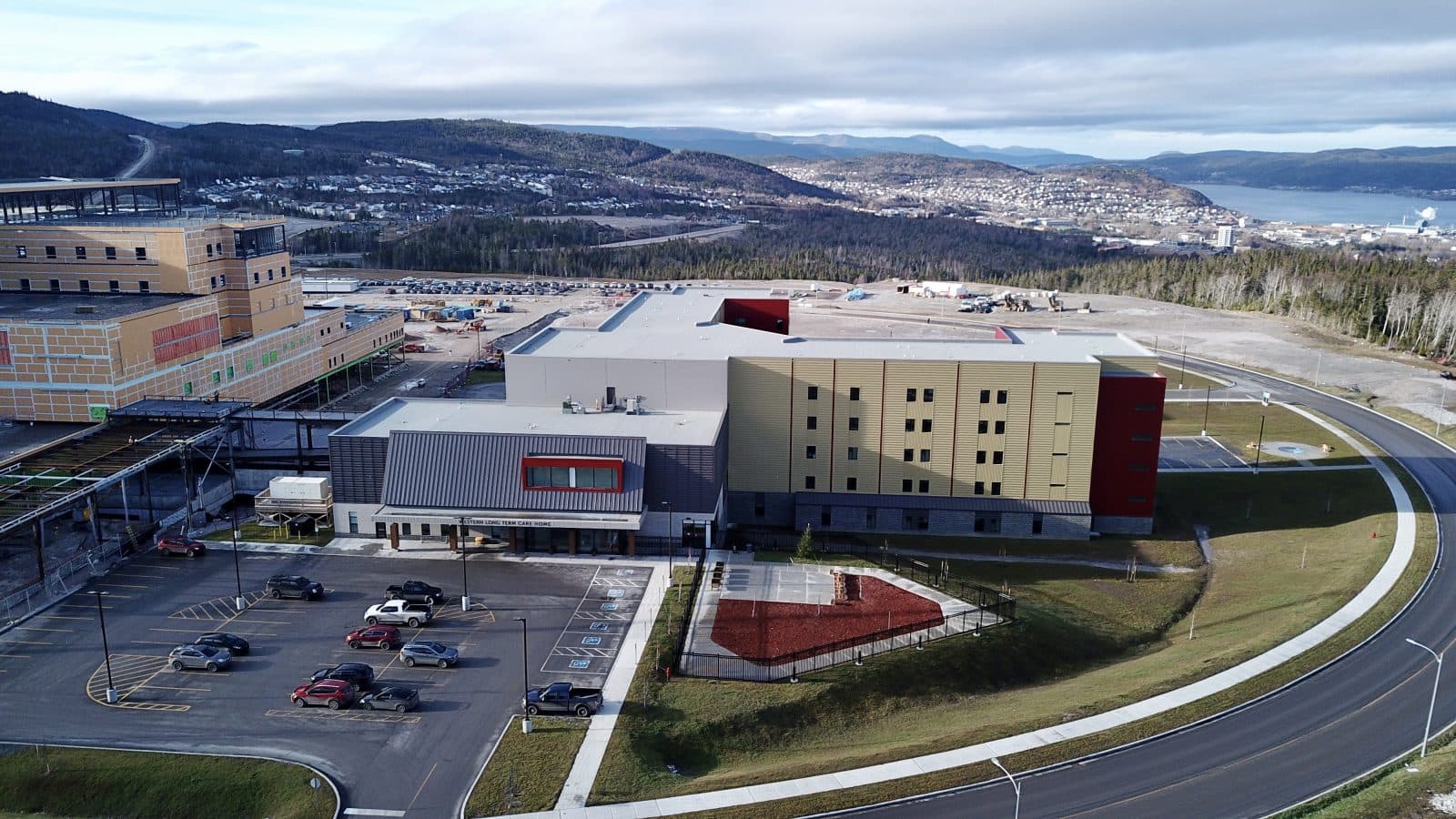 Aerial view of the Corner Brook long-term care facility with a view of Corner Brook in the background