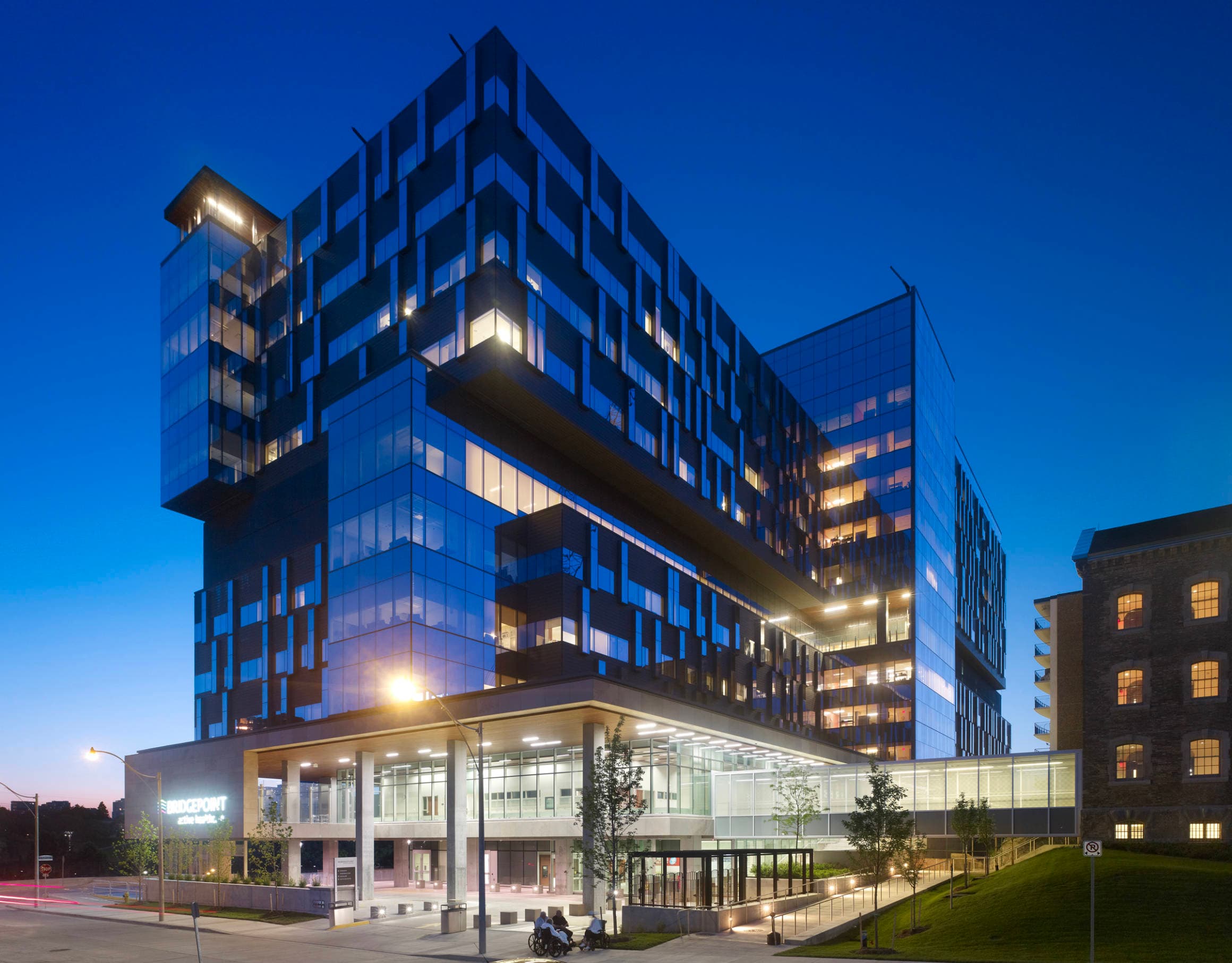 Exterior nightime view of the Hennick Bridgepoint Hospital entrance