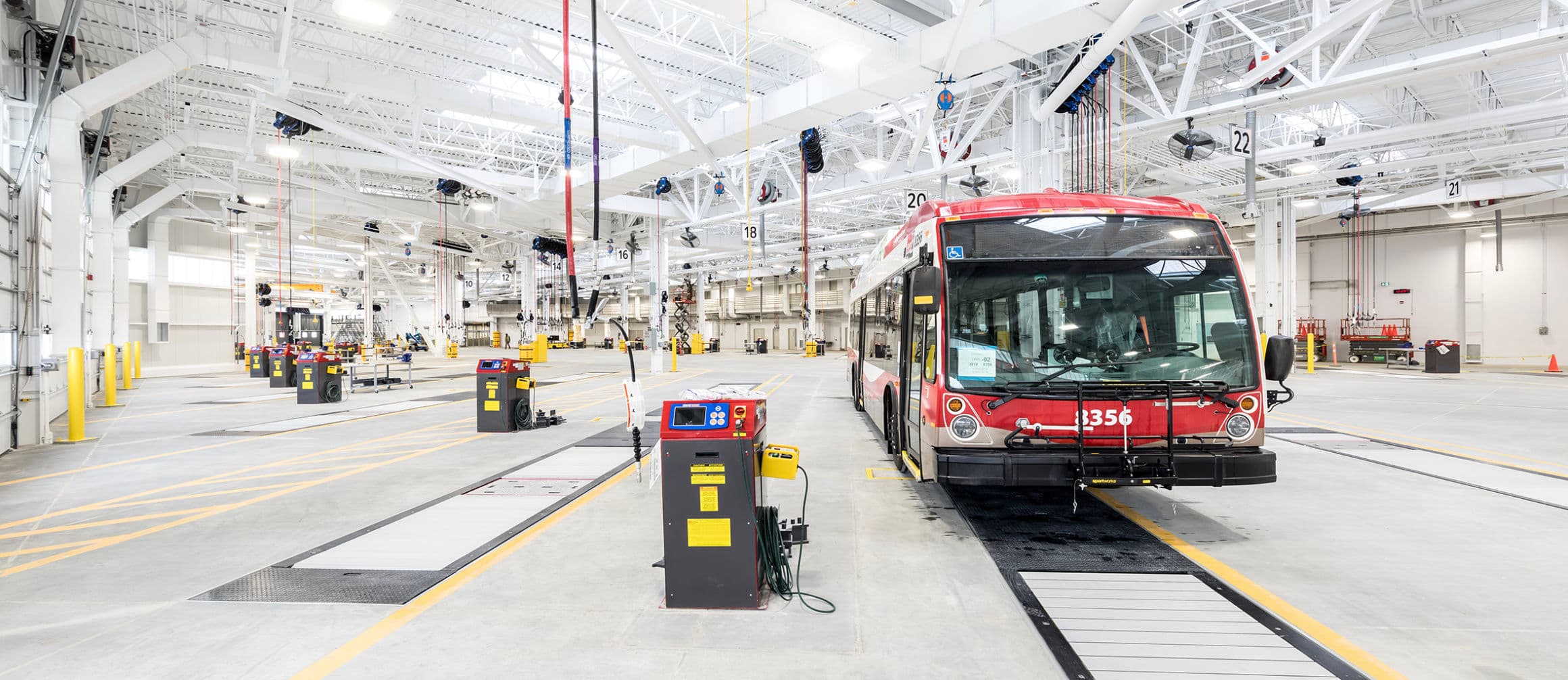 Bus at a maintenance bay inside the facility